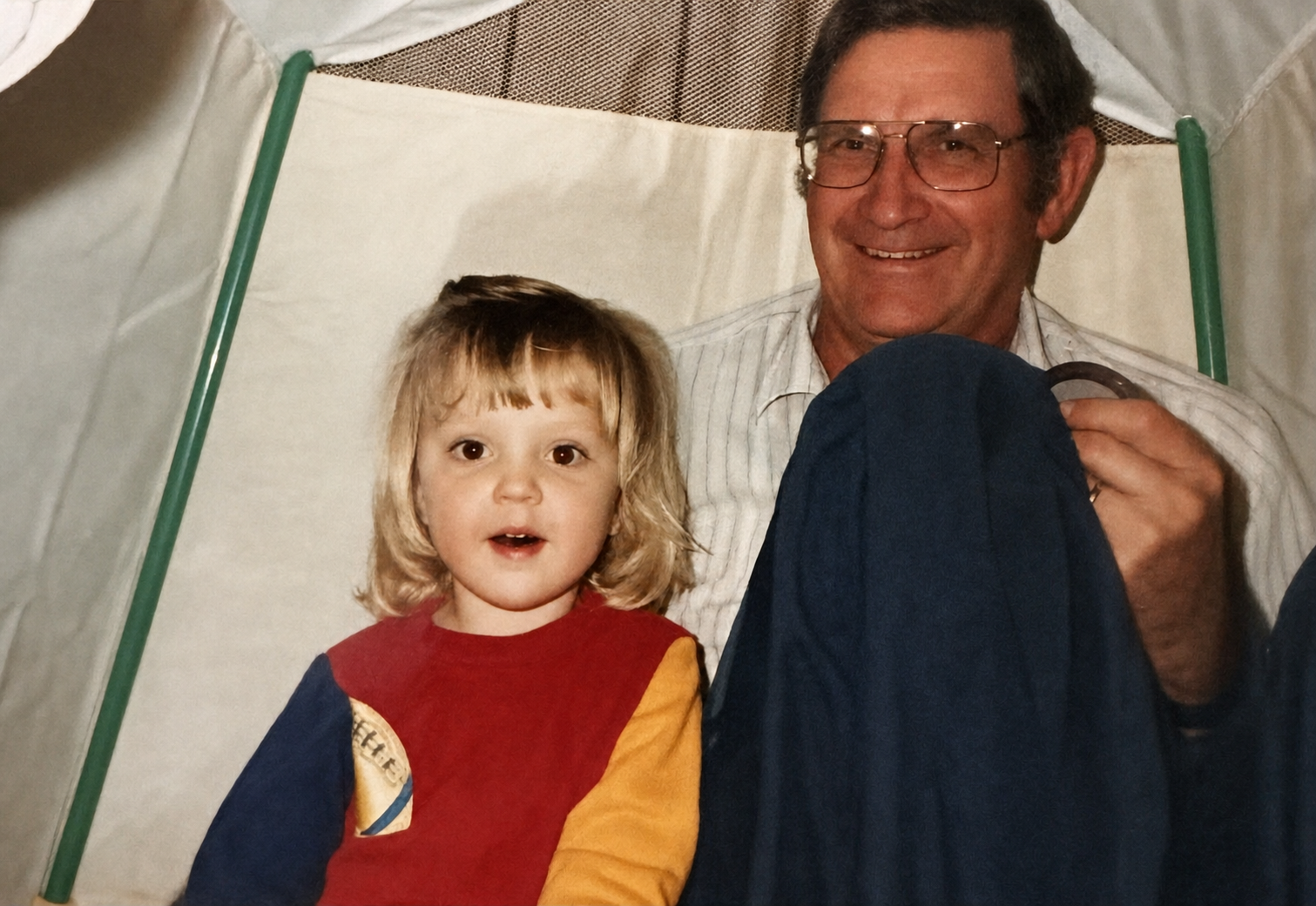 Larry Ivan Skinner smiling beside his granddaughter Ashley